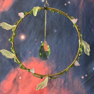 Gold ring wrapped in leaves & flowers